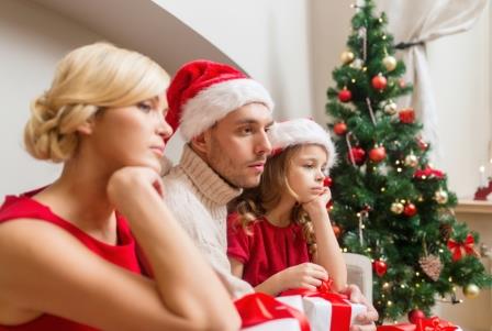 depressed family at home with many gift boxes