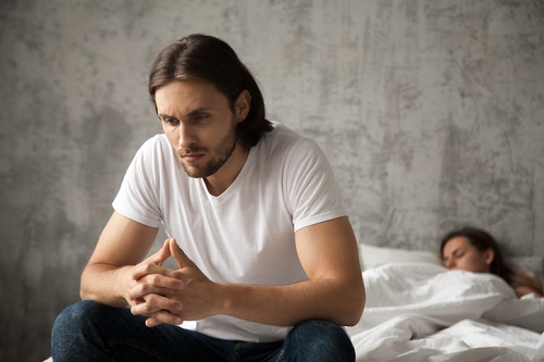 Thoughtful worried frustrated man thinking of problem while girl